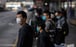 People wear face masks in Mong Kok on February 25. It is simply not possible for all in Hong Kong to use masks without creating a severe shortage. If we all use them, we would need a minimum of 200 million a month. Photo: EPA-EFE