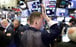 A trader smacks his brow at the opening bell of the New York Stock Exchange in New York on March 16, 2020. Stocks have been highly volatile in the world’s largest economy. Photo: EPA-EFE A trader smacks his brow at the opening bell of the New York Stock Exchange in New York on March 16, 2020. Stocks have been highly volatile in the world’s largest economy. Photo: EPA-EFE