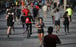 People exercise on a seafront promenade in Barcelona, Spain. Photo: AP