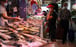 A shopper stops at a fish stall in Kowloon City Market on Wednesday. Photo: Nora Tam