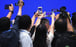 Members of the press take photos of Zhang Xiaoming, deputy director of the State Council’s Hong Kong and Macau Affairs Office, at a media conference in Beijing on July 1. Why was Zhang’s visit to Hong Kong to hear views on extending the term of Hong Kong’s current legislature shrouded in secrecy? Photo: Simon Song