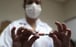 A nurse holds a potential vaccine from China’s SinoVac before administering it during trials in Brazil. Photo: Reuters
