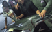Indonesian crew with an illegally killed dolphin aboard a Taiwanese vessel. Photo: Handout/Environmental Justice Foundation