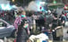 Riot police fire tear gas on Argyle Street near Langham Place in Mong Kok on Saturday January 25, 2020. Photo: RTHK