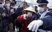 A passenger is surrounded as she disembarks the Diamond Princess cruise ship in Yokohama, Japan. Photo: EPA