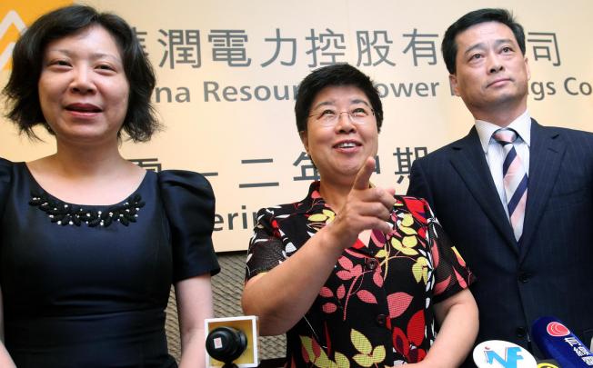 (From left) China Resources Power chief financial officer Wang Xiaobin, chairwoman Zhou Junqing and president Wang Yujun. Photo: May Tse