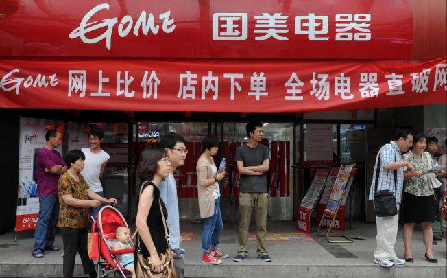 Gome says its shops give it an edge over web vendors. Photo: Xinhua