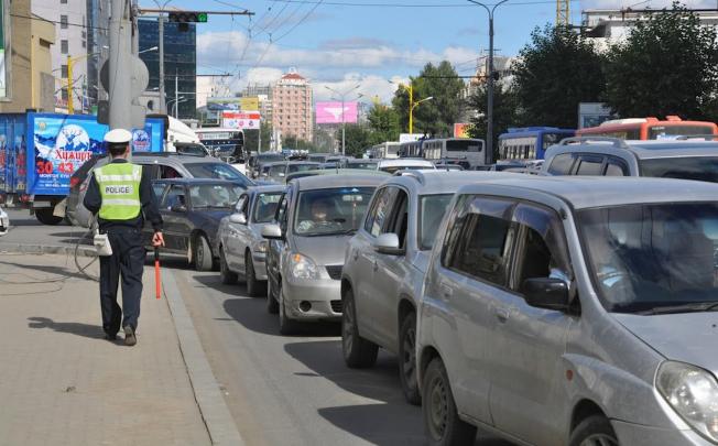 Affluent Mongolians, who import luxury vehicles, has contributed to the traffc problems in Ulan Bator.