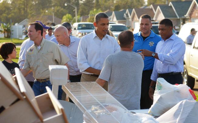 US President Barack Obama tours a neighbourhood in St John the Baptist parish in Louisiana on Monday. Photo: AFP