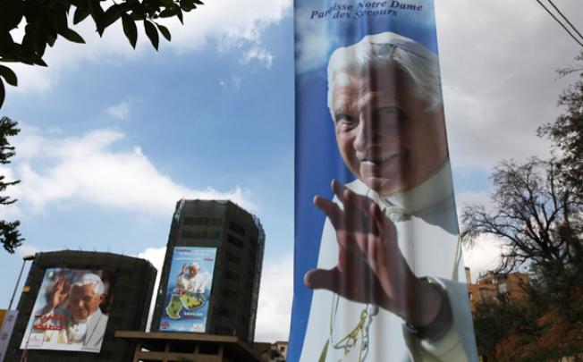 Posters welcoming Pope Benedict XVI decorate the Christian port city of Jounieh, north of Beirut, on Wednesday. Photo: AFP
