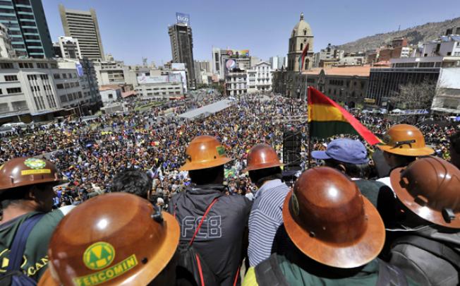 Miners from private cooperatives gather after marching in La Paz on Tuesday to protest against the government of President Evo Morales. Photo: AFP 
