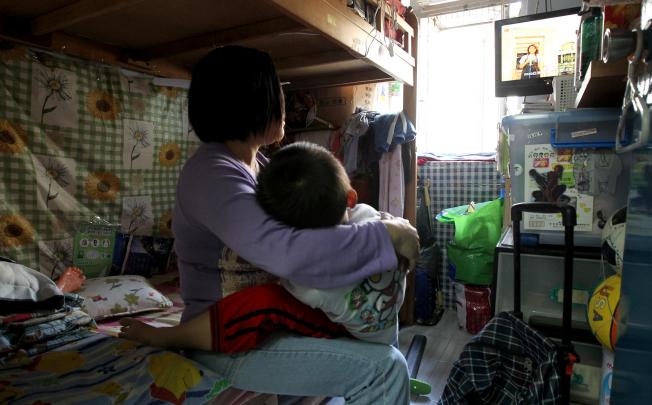 Many new mainland migrants, such as Mrs Li, live below the poverty line until they become eligible for housing and other social welfare benefits. Photo: K.Y. Cheng
