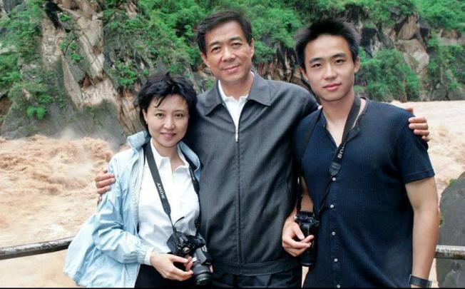An undated handout photo of Bo Xilai, centre, his wife Gu Kailai, left, and their son Bo Guagua. 