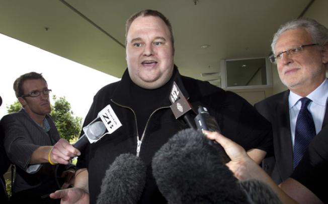 Kim Dotcom, the founder of the file-sharing website Megaupload, comments after he was granted bail and released on February 22 in Auckland, New Zealand. Photo: AP