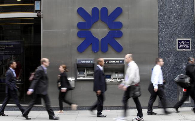 RBS is one of at least a dozen banks being investigated by regulators over allegations that traders colluded on Libor rates. Photo: Bloomberg