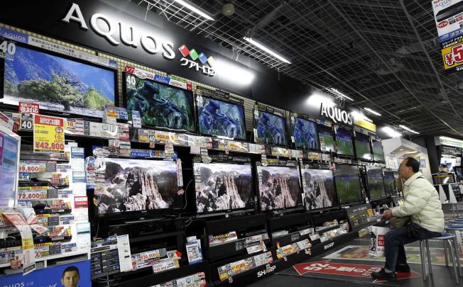 Television maker Sharp is cutting jobs and selling assets in a bid to cut costs and return to profit in the next financial year. Photo: Reuters