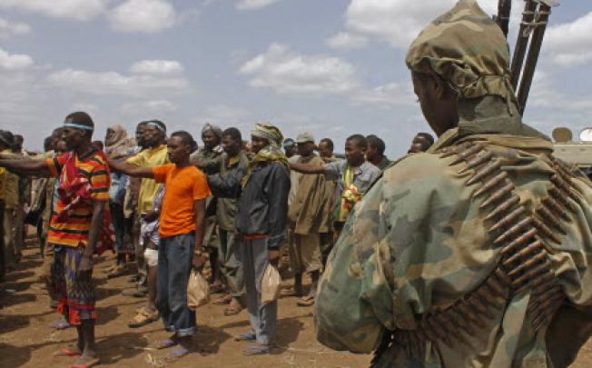 Al-Qaeda linked Shebab after giving themselves up to forces of the African Union Mission in Somalia. Photo: AFP 