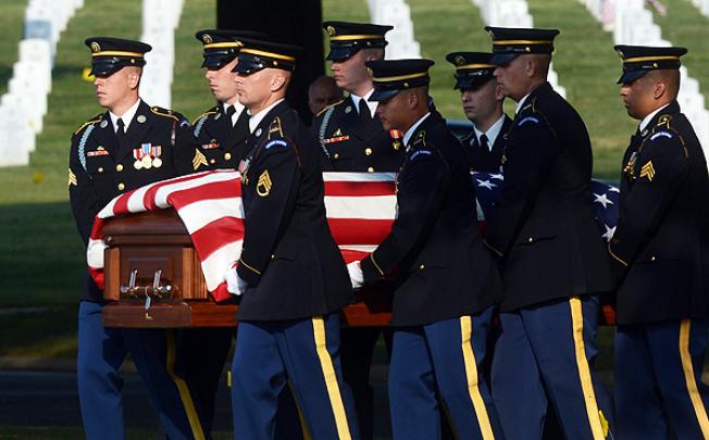 A burial service at Arlington cemetery, Virginia, for US Army Chief Warrant Officer Thalia Ramirez who was killed on duty in Afghanistan. Photo: EPA