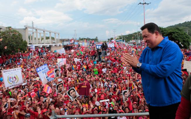 Venezuela's President and election candidate Hugo Chavez (right) participating in a campaign rally in Yaritagua, Yaracuy state, on Tuesday. Photo: Xinhua