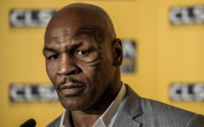 US boxer and former heavyweight world champion Mike Tyson addresses a press conference in Hong Kong. Photo: AFP