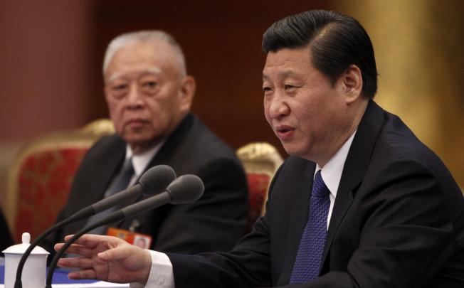 Chinese vice president Xi Jinping, right, and former Hong Kong Chief Executive Tung Chee-Hwa, left, meet with  the Hong Kong delegation to the National People's Congress in Beijing in this March 4, 2012 file photo. Photo: SCMP