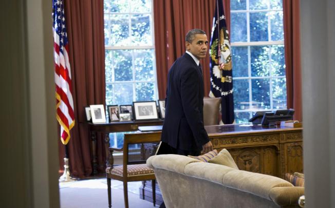 President Obama in the Oval Office. The US jobless rate dropped to 7.8 per cent in September, its lowest since he took office. Photo: NYT