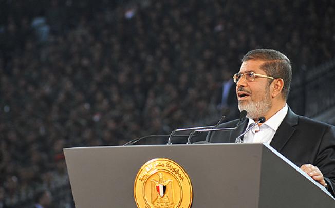 Egypt President Muhammed Mursi delivers a speech in Cairo on Sunday. Photo: AFP