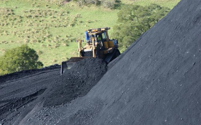 BHP to axe iron ore jobs as slowdown bites