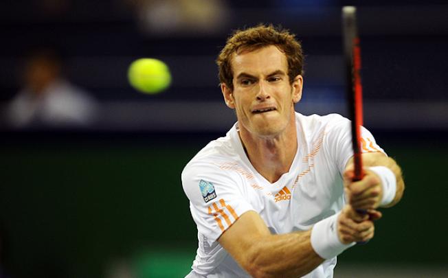 Andy Murray hits a return to Alexandr Dolgopolov at the Shanghai Masters. Photo: AFP