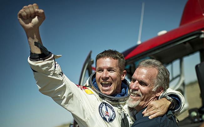 Felix Baumgartner with technical project director Art Thompson after the jump. Photo: AFP