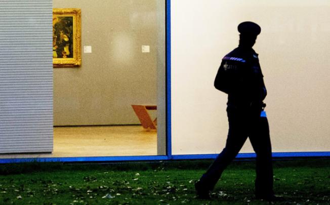 The white spot on the wall marks the gap left by one of the stolen paintings in the Kunsthal museum, Rotterdam, on Tuesday. Photo: EPA