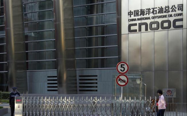 Zhang Zhirong profited from CNOOC's takeover bid. Photo: Reuters