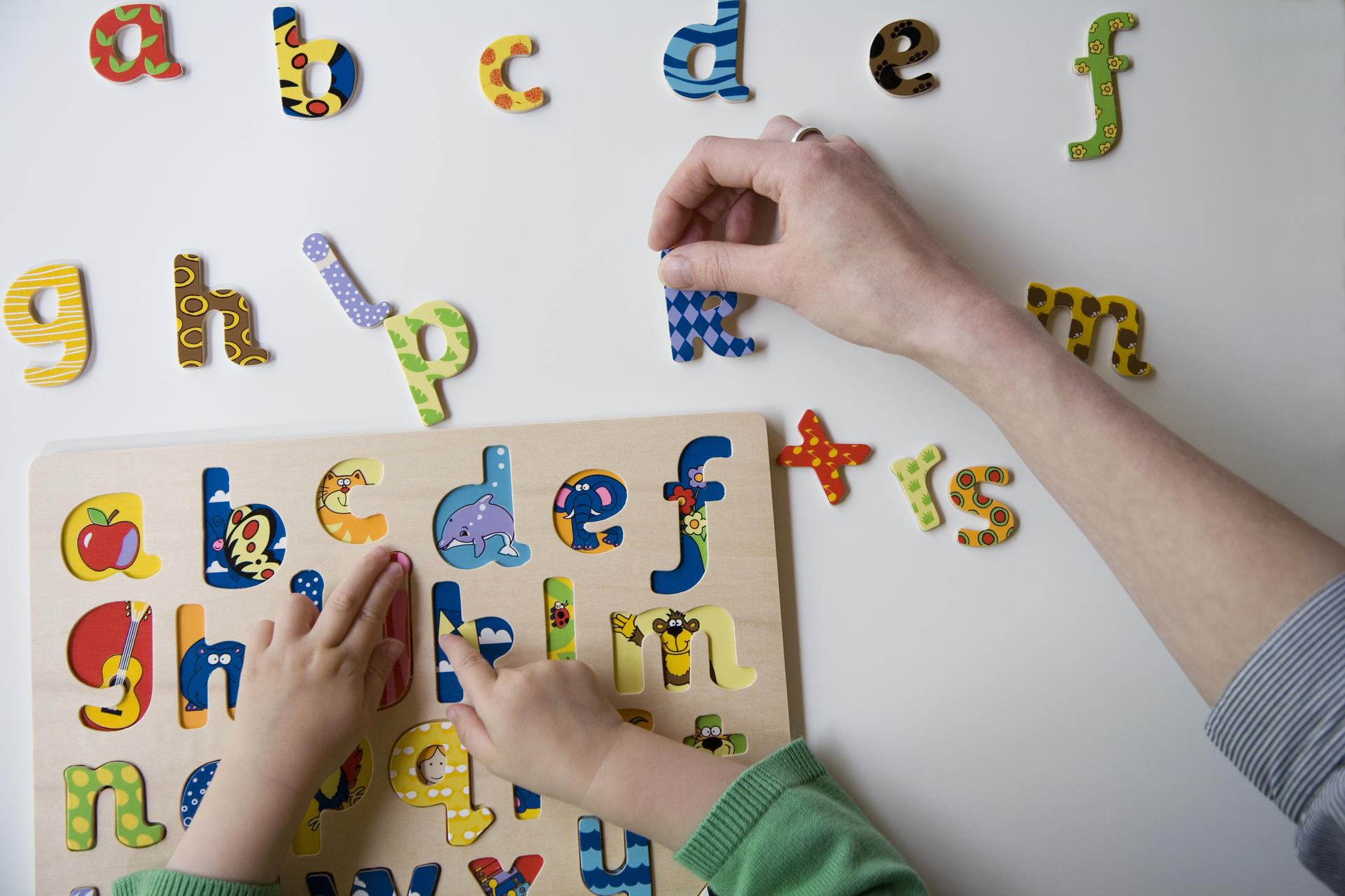 A little praise goes a long way when youngsters are learning to spell. Photo: Corbis