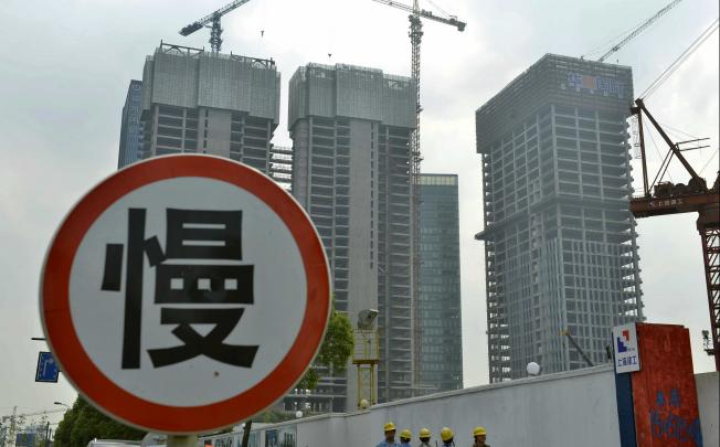 China's economy is still digesting the misallocation of capital for dubious infrastructure projects. Photo: Xinhua