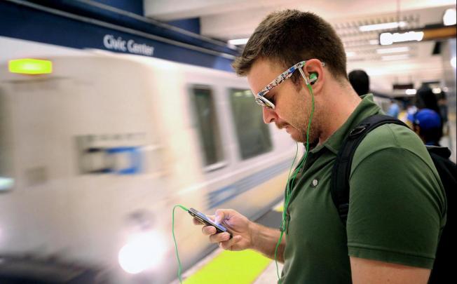 Most cellphone thefts happen on crowded trains and buses. People have been urged to 'be smart with your smartphone'. Photo: AP