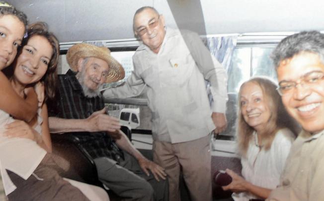 The photo shown to prove Fidel Castro is alive. He is seen with (from right) the visiting Jaua, his wife, and a hotel manager. Photo: AFP