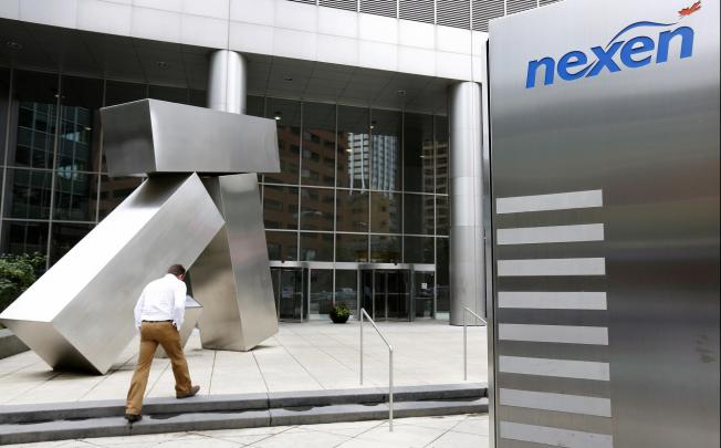 Third-quarter earnings of Nexen plunged.