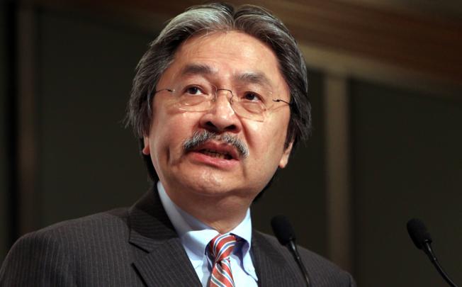 Financial Secretary John Tsang Chun-wah announced a 15 per cent stamp duty on home purchases by non-locals and companies. Photo: Jonathan Wong