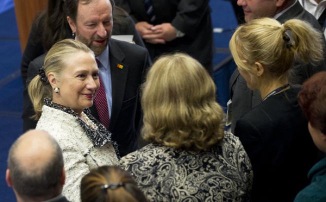 US Secretary of State Hillary Clinton (left) greets US Embassy employees and their families at the US Embassy in Sarajevo on Tuesday. Photo: AFP