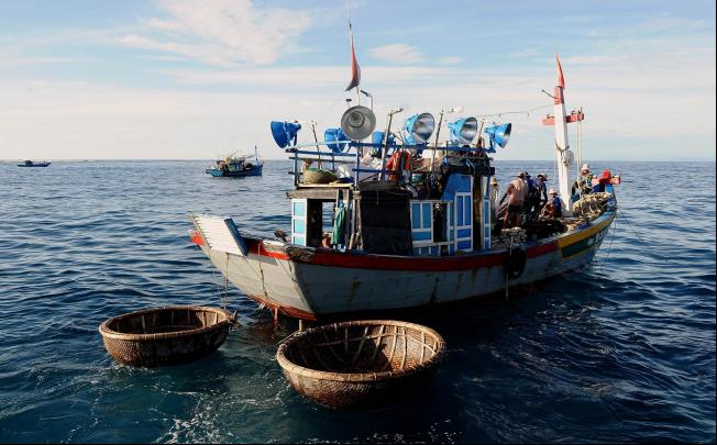 Fishing vessels prepare to leave from Ly Son Island to fish in waters off the disputed Paracel and Spratly islands. Photo: AFP