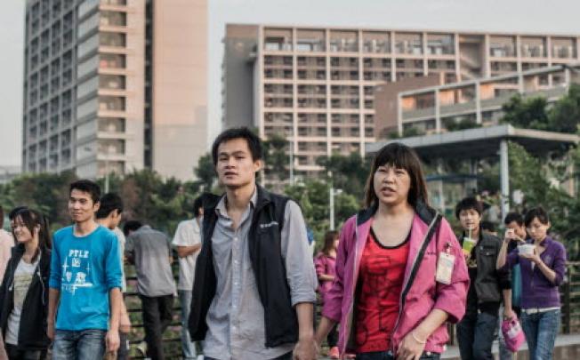 Young people at the end of a work day  in Shenzhen. Photo: AFP