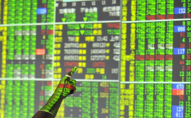 Asian markets are up on hopes that US unemployment is down and on expectations that China’s economy has turned the corner.  Photo: AFP