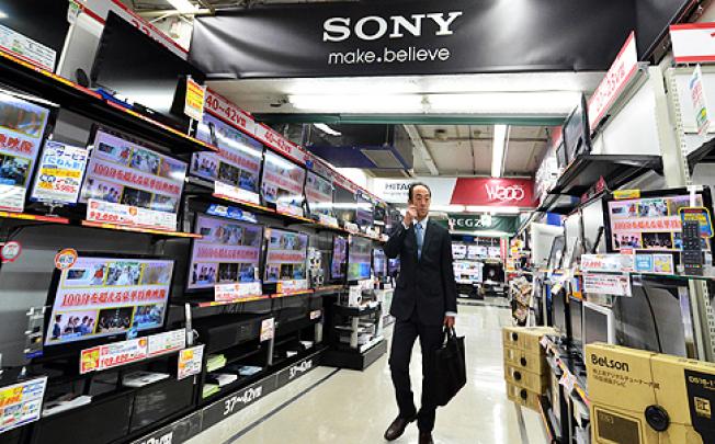 The Japanese electronics industry made huge investments in flat-screen televisions only to see prices plunge in an intensely competitive market Photo: AFP