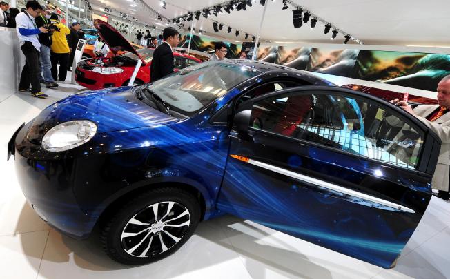 Chery's QQme at a car show. The firm will take advantage of its new partner's production and management experience to move to the higher end of the market. Photo: AFP