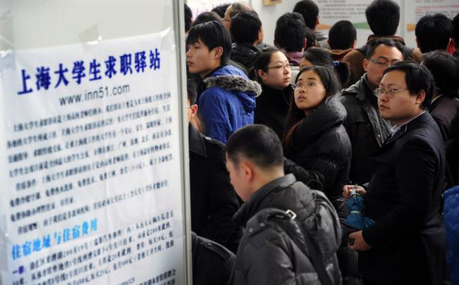 Recruitment fairs, such as this one in Shanghai, attract many keen job-seekers.