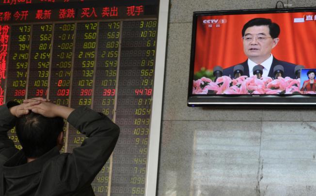 The market reacts as President Hu Jintao vows in Beijing yesterday to keep the GDP on track to double in size by 2020. Photo: Reuters