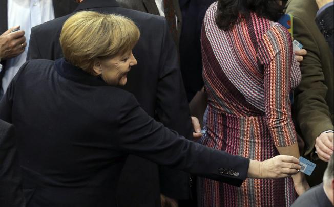 German Chancellor Angela Merkel casts her vote. Photo: AFP