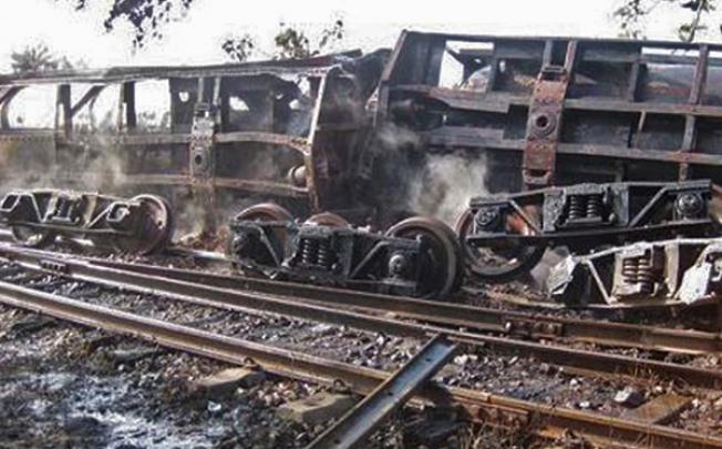 Burnt-out wagons at the site of a train derailment and an ensuing blaze that killed 25 people and injured nearly 100 more in northern Myanmar. Photo: AFP