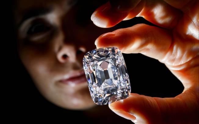 A model holds the "Archduke Joseph" diamond, a 76-carat giant from the Golconda mine that produced the famous Koh-i-noor. Photo: AFP