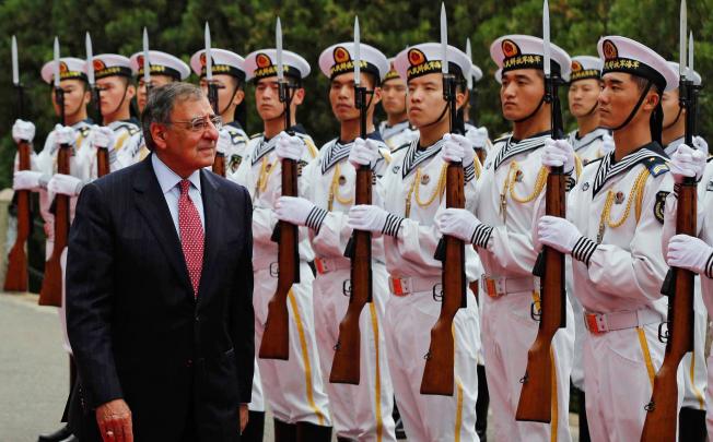 US Defence Secretary Leon Panetta reviews a naval honour guard in Qingdao before touring vessels of China's North Sea Fleet, during a visit to the country in September. Photo: AFP